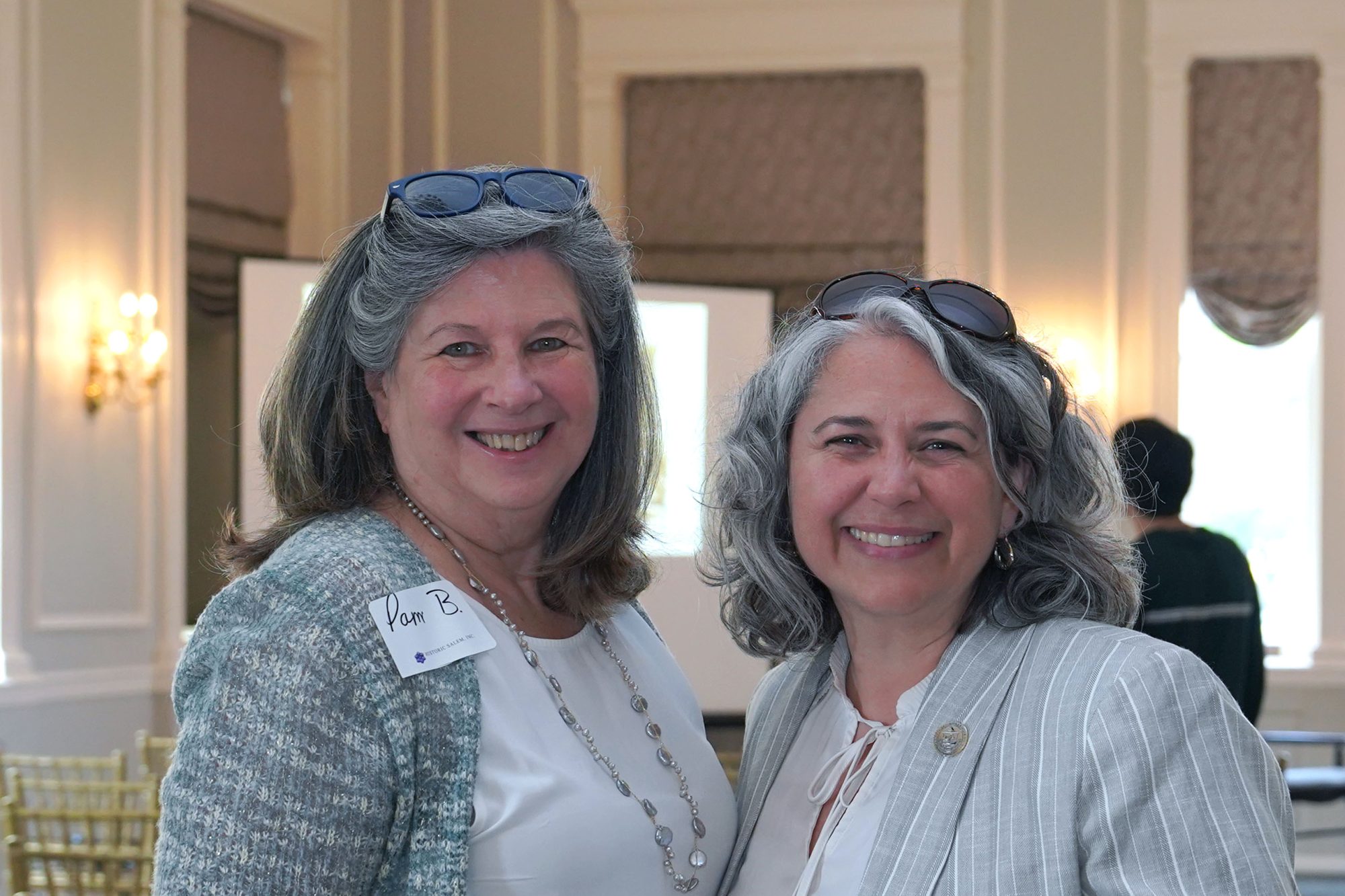 Two women stand together